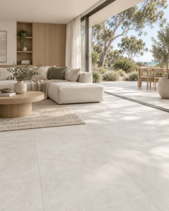 Warm minimalist living room with PORTLAND CROSSCUT White porcelain tile and light timber furniture