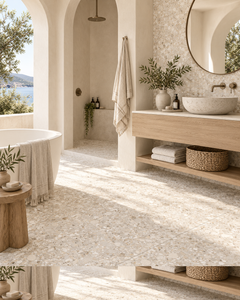Coastal resort bathroom with COBBLES Ivory aggregate-look porcelain tile, arches and oak vanity